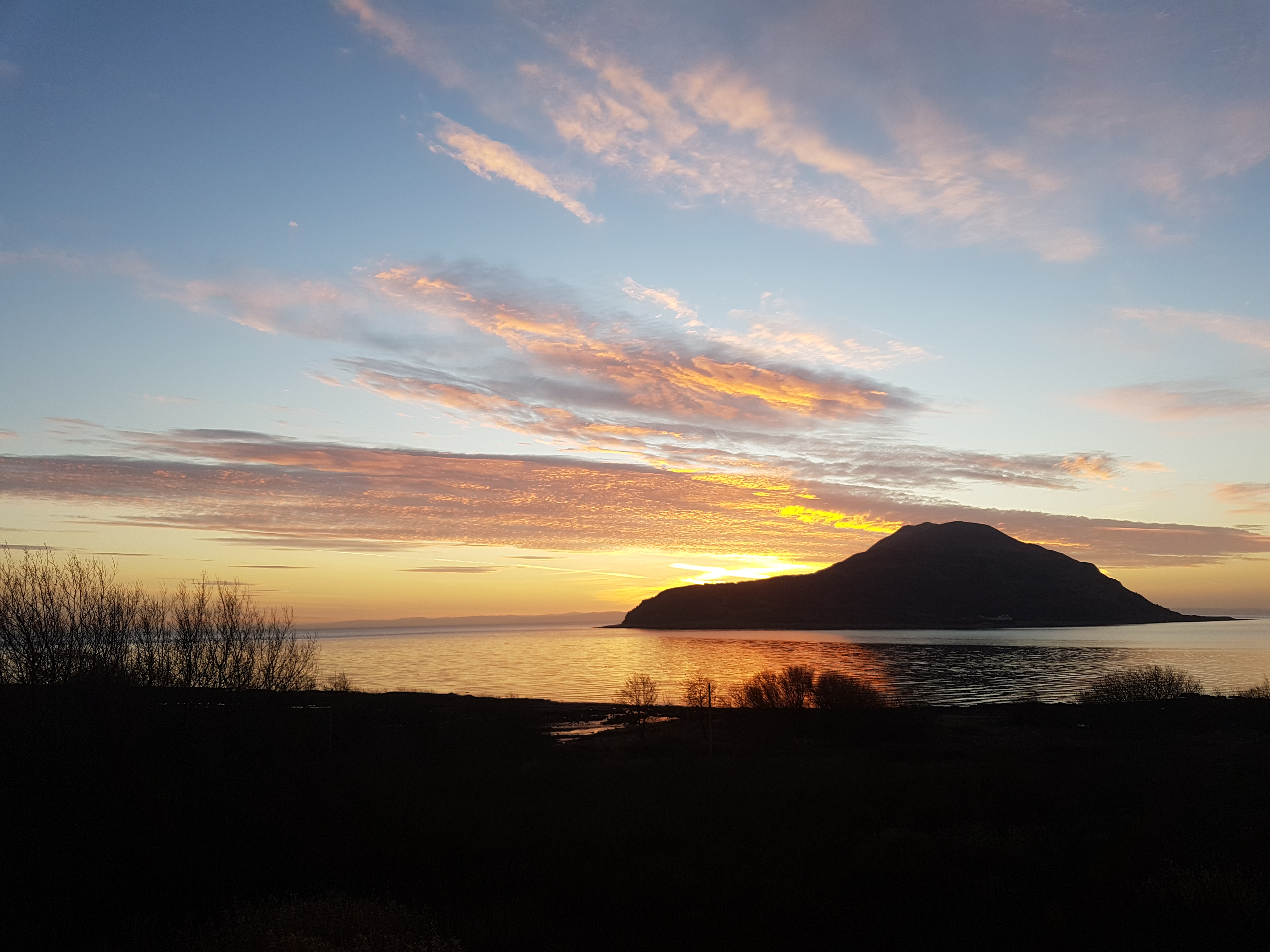 Holy Isle with sunset.