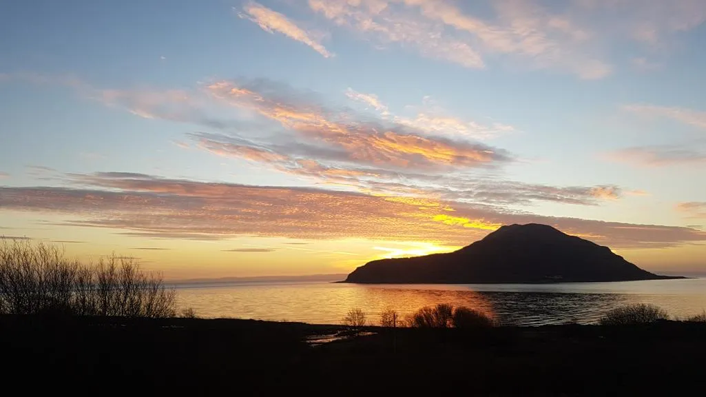 Holy Isle with sunset.